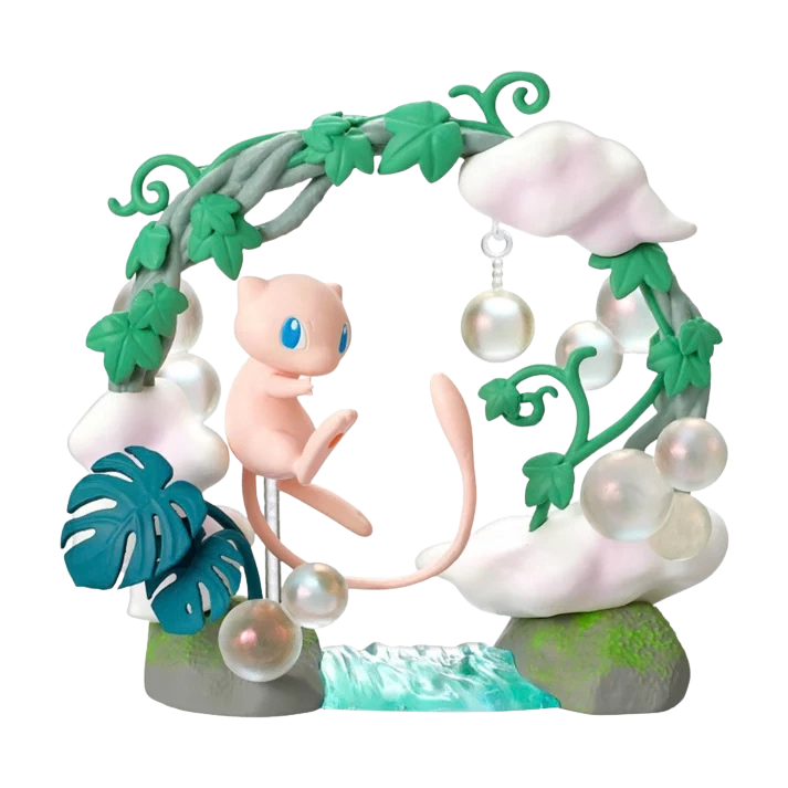 Mew collectible in a miniature garden with pearl-like bubbles